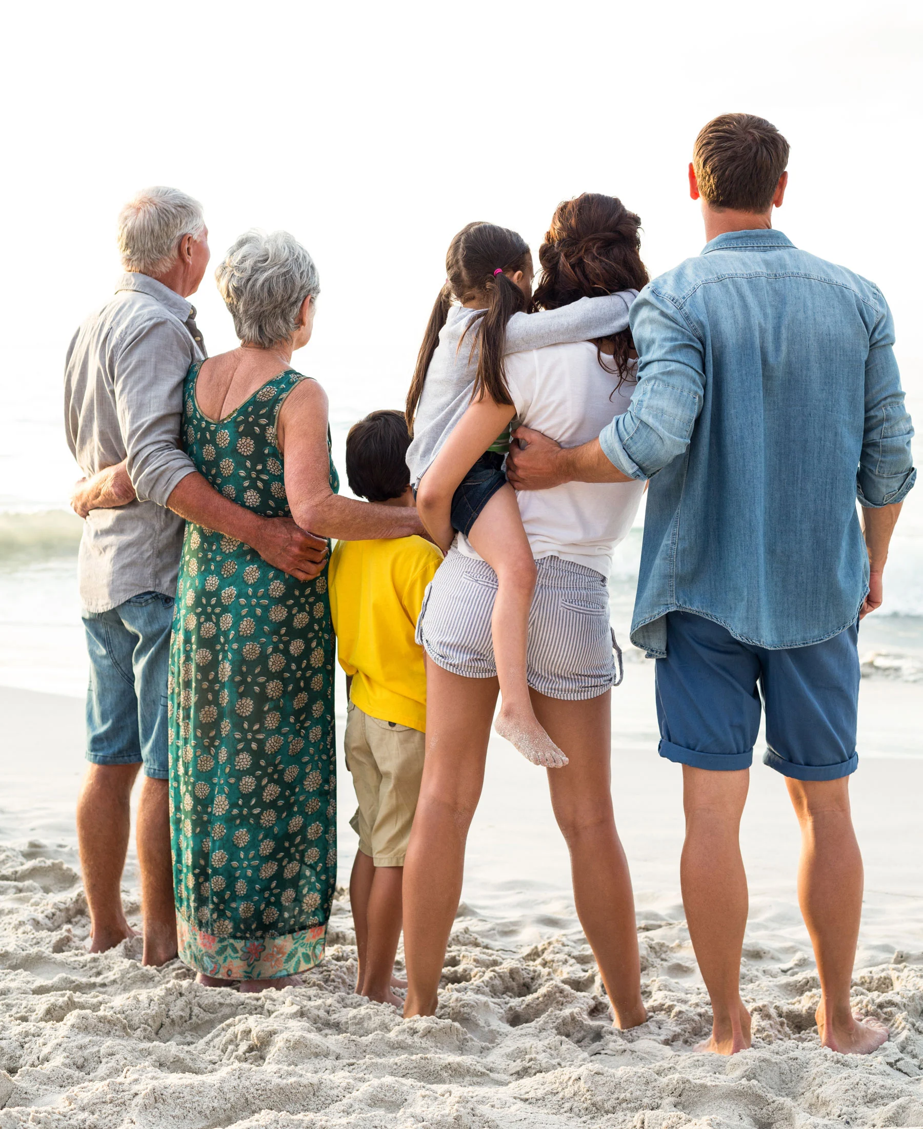 A multi-generational family together at the beach